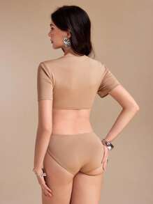 Spring Affair Body de un solo color con recortes sexy