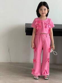 SHEIN DENIMLY YOUNG GIRL 休闲运动百搭可爱校园风街头时尚返校季运动季雪洗工艺牛仔短袖 T 恤和阔腿牛仔裤套装，粉色丝带蝴蝶结点缀拼接设计，全松紧腰带和后部实用口袋裤，酷女孩四季必备时尚百搭实用单品 - 粉色 - 查看 8