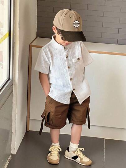 SHEIN Genkimix Kids Camisa informal de manga corta y un solo pecho de unicolor para niño