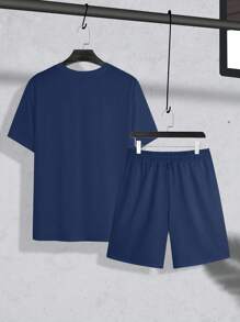 Manfinity Homme Set da uomo taglie forti composto da T-shirt a maniche corte con stampa a lettera e pantaloncini con coulisse e tasche, set da 2 pezzi