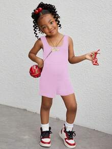 Tuta aderente in maglia a tinta unita per giovani ragazze