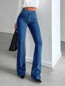 Jeans de algodón elástico con lavado oscuro y talle alto para mujer