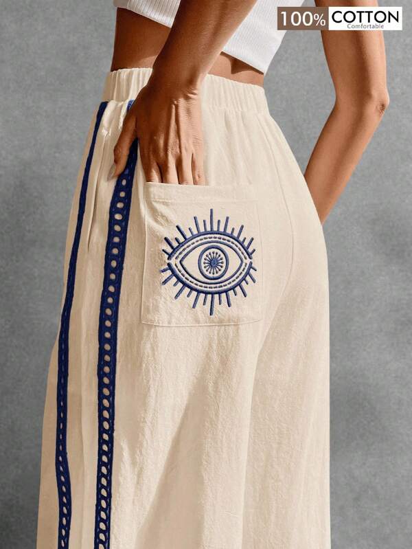 Poéselle Pantalones largos sólidos y sencillos de 100% algodón para mujer con bordado de patrón de ojo, estilo boho cottage core estético, estilo casual, piernas holgadas