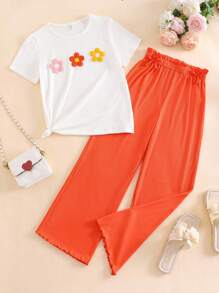 Set de 2 piezas para niñas: Camiseta de manga corta y cuello redondo blanca con decoración floral colorida emparejada con pantalones anchos de pierna ancha con volantes naranja, adecuado para uso de ocio en verano