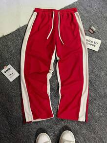 Manfinity EMRG بنطلون رجالي رياضي كاجوال فضفاض بربطة خصر و ساقين واسعتين بخصر قابل للسحب وخطوط جانبية متباينة