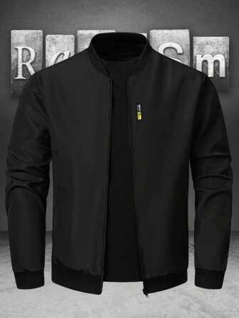 Manfinity Homme Chaqueta bomber de tela negra para hombre con mangas largas regulares y cierre con cremallera para uso diario, otoño