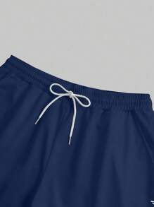 Manfinity Homme Set da uomo taglie forti composto da T-shirt a maniche corte con stampa a lettera e pantaloncini con coulisse e tasche, set da 2 pezzi