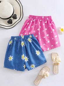 2件套女孩活泼度假向日葵心笑脸牛仔效果印花不对称下摆短裤，蓝色和粉色组合，适合夏季外出