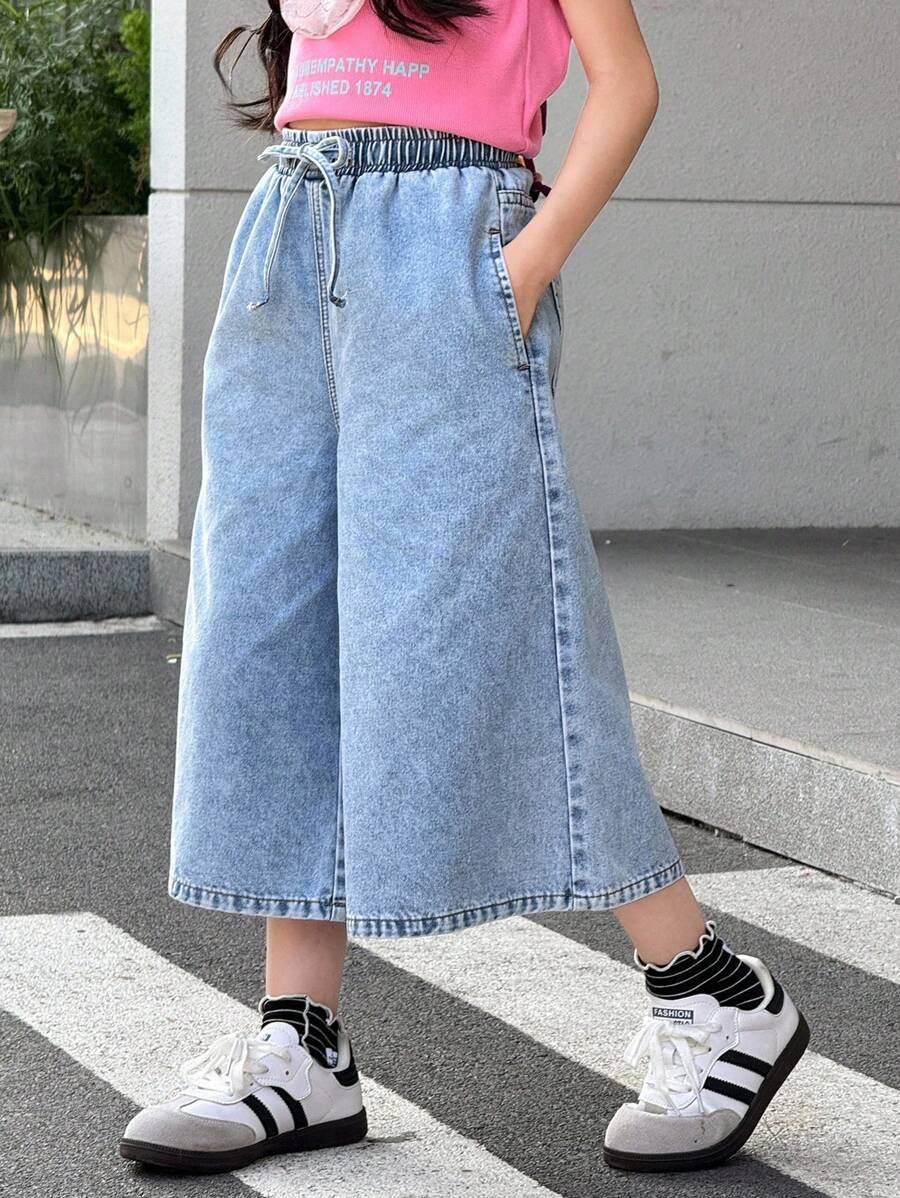 SHEIN 少女Y2K时尚浅色水洗宽松弹力抽绳腰牛仔阔腿裤，适合音乐会、节日、休闲派对、秋季日常穿着，也适合返校、返校节、锐舞派对、街头服饰、学校、生日、旅行、机场、早午餐、教堂、毕业典礼等场合。 - 淺色水洗藍 - 查看 1