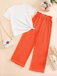 Set de 2 piezas para niñas: Camiseta de manga corta y cuello redondo blanca con decoración floral colorida emparejada con pantalones anchos de pierna ancha con volantes naranja, adecuado para uso de ocio en verano