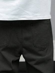 Manfinity EMRG 大码男士都市街头休闲宽松黑色破洞牛仔裤男士宽松直筒休闲裤