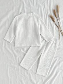 Vintaside Kids Tenue minimaliste pure blanche pour bébés garçons, printemps/automne, sans imprimé, Top à demi-patte manches longues assorti à un pantalon long. Convient pour se promener à l'extérieur pour ressentir les changements de saison, comme tenue décontractée pour l'intérieur, dégageant également une petite touche de gentleman propre et soigné pour les fêtes, permettant à l'enfant de se sentir à l'aise en toute occasion.