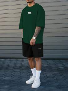Manfinity Homme Áo thun nam rộng rãi, quần short lưng thun co giãn, hai mảnh, đơn giản, không khí mùa xuân và mùa hè, 100 màu tương phản, thiết kế nhãn nhỏ, điểm nhấn - Nhiều màu - Xem 1