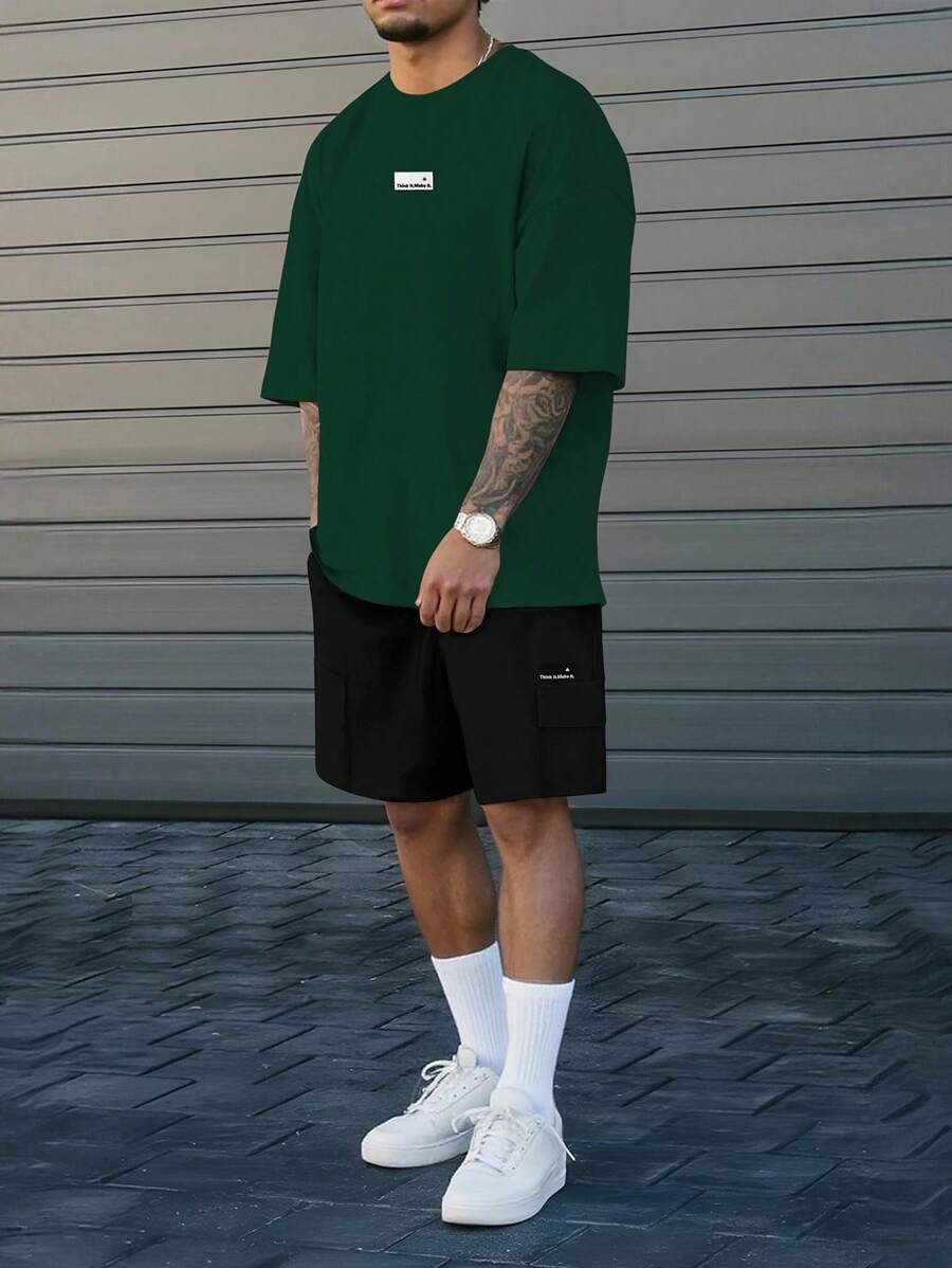 Manfinity Homme Áo thun nam rộng rãi, quần short lưng thun co giãn, hai mảnh, đơn giản, không khí mùa xuân và mùa hè, 100 màu tương phản, thiết kế nhãn nhỏ, điểm nhấn - Nhiều màu - Xem 1