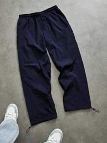 Manfinity Sport Corelite Pantalones largos informales de hombre con cintura elástica con cordón y estampado