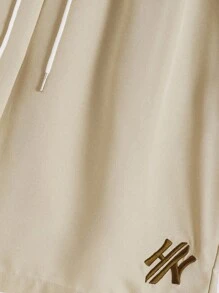 Manfinity Homme Conjunto de top con cuello redondo y pantalones cortos con estampado de letras para hombres, conjunto de prendas cortas para hombres