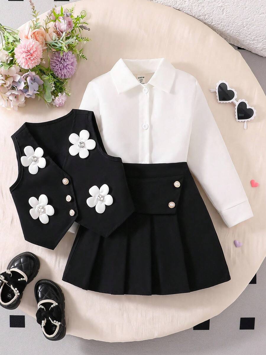 Genkimix Kids Girls' School Style White Long Sleeve Shirt Paired With Black Vest Featuring 4 Handmade Pleats, Inverted Triangle Patch, And 2 Button Closure Vest With 6 Dimensional Flowers, School Uniform Set, Back To School, All Season - Black - View 1