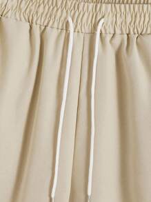 Manfinity Homme Conjunto de top con cuello redondo y pantalones cortos con estampado de letras para hombres, conjunto de prendas cortas para hombres