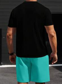 Manfinity CasualCool Conjunto de camiseta casual de manga corta con cuello redondo y estampado de letras, y pantalón corto con cintura con cordón, talla grande para hombre