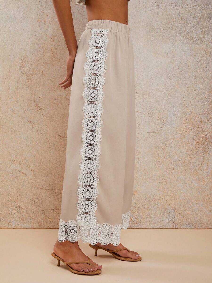 COSMINA Pantalon long pour femmes de style bohème, tenue d'été décontractée pour vacances tropicales, couleur ivoire, patchwork avec garniture en dentelle à l'ourlet - Beige - Voir 1