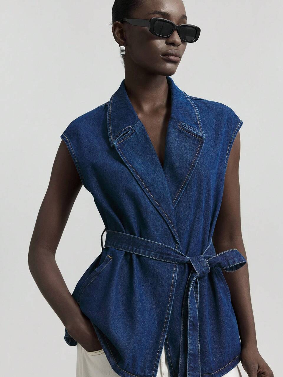 Women's Blue Denim Jacket With Retro Lapel Sleeveless Vest And A Belt. An Elegant French Jacket Perfect For Autumn.