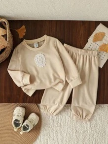 Souflis Souflis Baby Girl Fashion Simple Lace Badge Long Sleeve Round Neck Sweatshirt And Tie Waist Pants 2pcs Outfit Set, Suitable For Spring And Autumn, Daily Wear, Outings, College, Park, Playground Cream Baby Girl Outfit Baby Set Autumn Winter Season Toddler Cream Outfit - Apricot - View 3