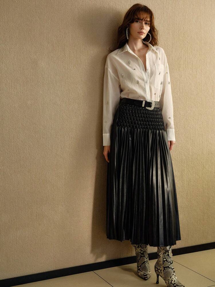 TEXTURED PLEATED SKIRT