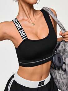 Easithlete 1pc Moisture Wicking Fabric Basic Sports Bra, Contrast Color Strap, Hollow Back, Black - Black and White - View 1