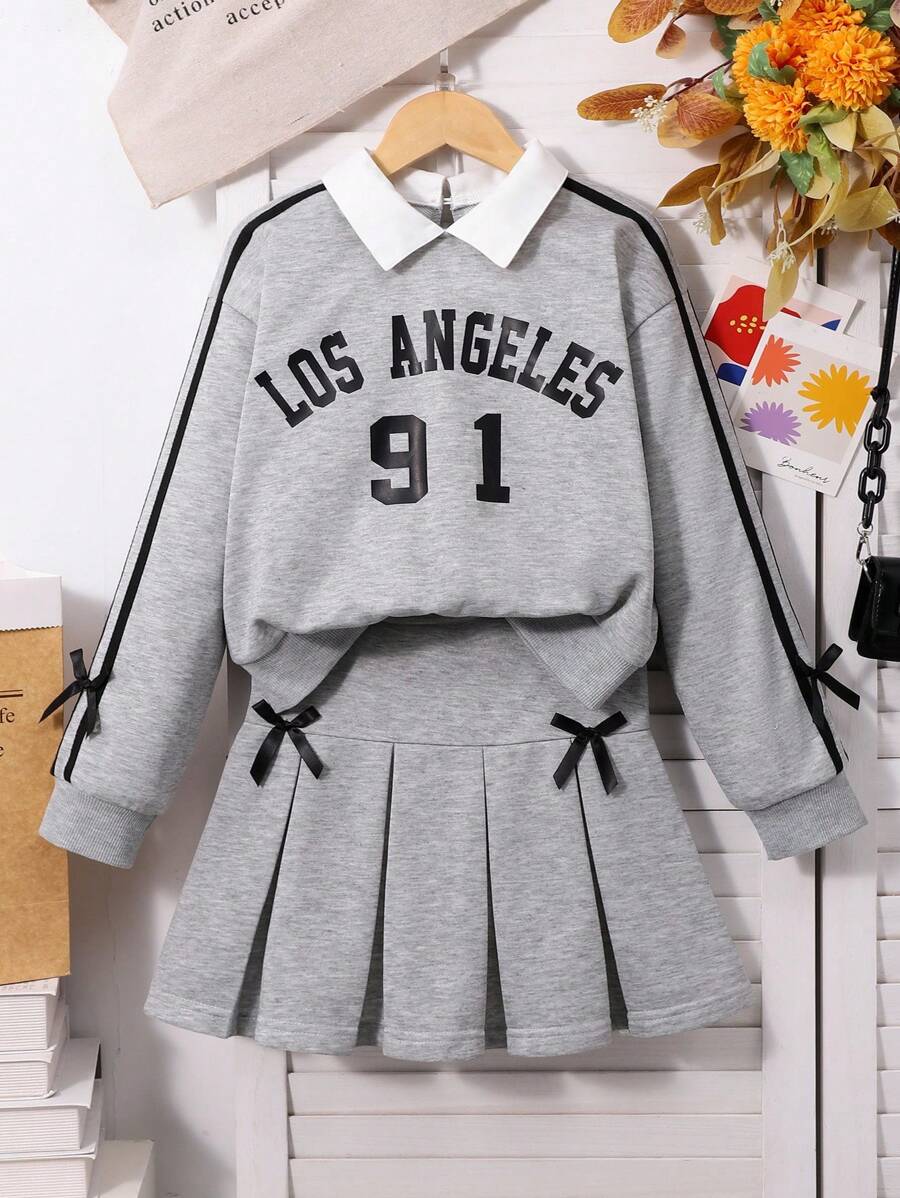 SHEIN 2pcs/Set Teen Girls' School Style Shirt Collar 2 In 1 English Graphic Long Sleeve Sweatshirt With Matching Pleated Mini Skirt, Featuring Contrasting Sleeve Ribbons And Bowknot Decor, Comfortable Knit Fabric, Youthful And Vibrant Look, Suitable For School Or Casual Wear Fall Winter
