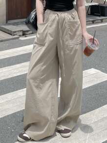 Livesso Pantalones anchos informales y sueltos con bolsillos grandes para mujer de talla grande