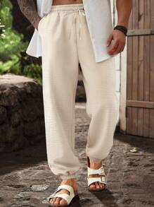 Manfinity Homme Pantaloni casual da uomo taglie forti con vita con cordoncino, tasche, pantaloni da vacanza, pantaloni casual da uomo - Albicocca - Visualizzare 1