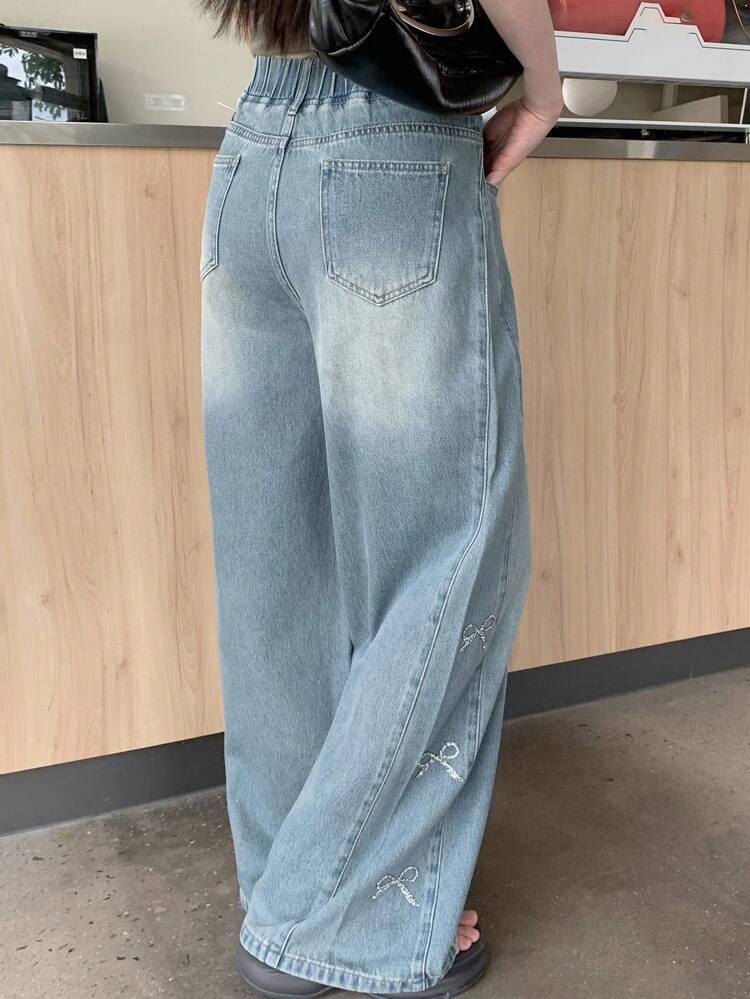 Women's Flared Leg Jeans With Bowknot