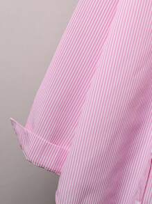 Camisa de una sola hilera de bolsillo con hombro caído y manga larga a rayas para niña adolescente