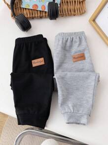Set de 2 pantalones largos informales de unicolor de cintura elástica para niños pequeños
