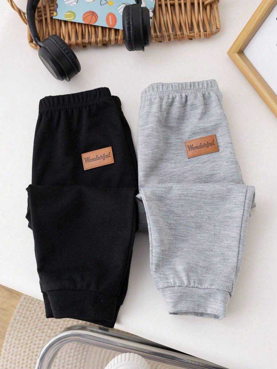 Set de 2 pantalones largos informales de unicolor de cintura elástica para niños pequeños