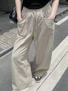 Livesso Pantalones anchos informales y sueltos con bolsillos grandes para mujer de talla grande