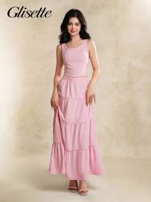 青少年（女孩）两件套服装，春夏休闲优雅，包括粉色无袖蝴蝶结吊带衫和粉色长裙