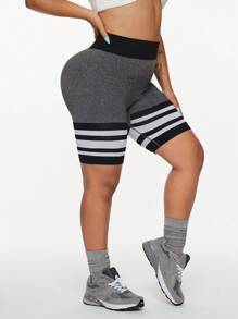 Rhythm Era Short deportivo sin costuras, de talla grande, con bloques de color y rayas para mujeres - Multicolor - Ver 5