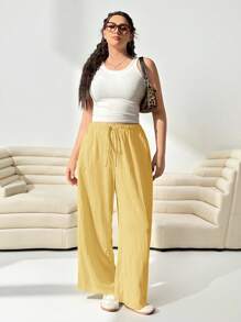 SHEIN EZwear Pantalones largos sueltos tejidos de color jengibre para mujeres de talla grande