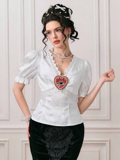 EDITION Blouse femme au style vintage, style palais, avec pendentif en cristal et perles en forme de cœur sur le col en V, avec bordure en dentelle et manches bouffantes