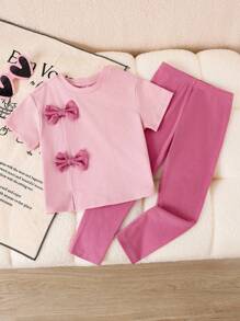 2 pezzi Set composto da maglietta girocollo in maglia monocolore e pantaloni skinny per ragazze giovani