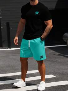 Manfinity CasualCool Conjunto de camiseta casual de manga corta con cuello redondo y estampado de letras, y pantalón corto con cintura con cordón, talla grande para hombre