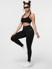 SHEIN Essnce Leggings deportivos casuales con estampado de letras de punto elástico para mujer. Leggings negros para mujer adecuados para salir, ropa de otoño, ropa deportiva femenina - Negro - Ver 5