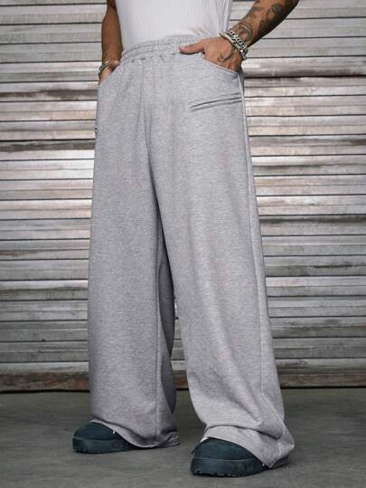 AXEPEAK Pantalón de chándal holgado casual para hombre con cintura elástica sólida, bolsillos y pierna ancha