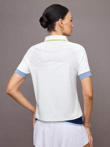 Activina Polo sport à manches courtes avec demi-zip et couleurs contrastées pour femmes, Été