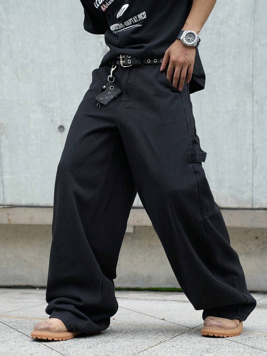 Manfinity EMRG 男士黑色宽松牛仔工装阔腿裤，完美契合嘻哈街头风格和前卫时尚。这款宽松长款阔腿牛仔裤兼具舒适感与都市时尚感，是现代衣橱的理想之选。 - 黑色 - 查看 1