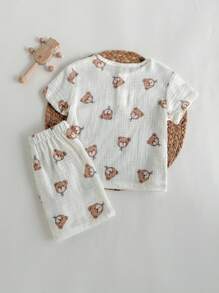 Loomiva 2 Stücke Set für Jungen mit Cartoon-Bären-Print, Rundhalsausschnitt, kurzärmeliges Henley-Top und Shorts mit elastischer Taille. Sommer-2 Stücke Set für Jungen aus Musselin für Babys, Leinen-Set für Kleinkinder, Hemd-Sets für Kleinkinder, Sommer-Gaze-Oberteile