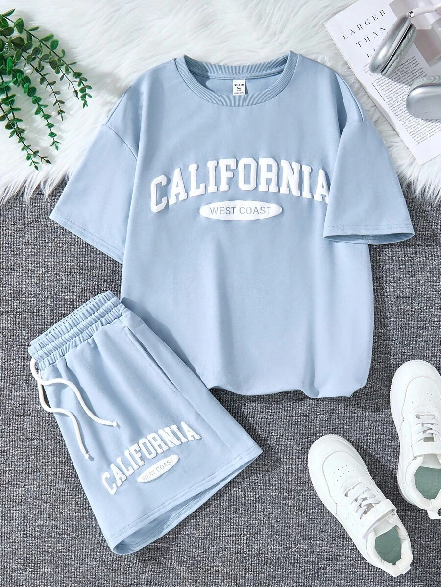 SHEIN 少女 2 件套灰色针织休闲宽松美式英语标语印花圆领短袖 T 恤和印花短裤，适合夏季街头运动 - 淺藍色 - 查看 1
