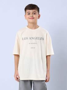 SUMWON قميص بتصميم LA مجموعة الصيف مؤرخ عام 23 ملابس الشارع الحضرية بقصة واسعة مريحة للاستخدام اليومي الأسلوب الحديث للشباب - لون مشمشي - مشاهدة 3