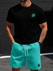 Manfinity CasualCool Conjunto de camiseta casual de manga corta con cuello redondo y estampado de letras, y pantalón corto con cintura con cordón, talla grande para hombre